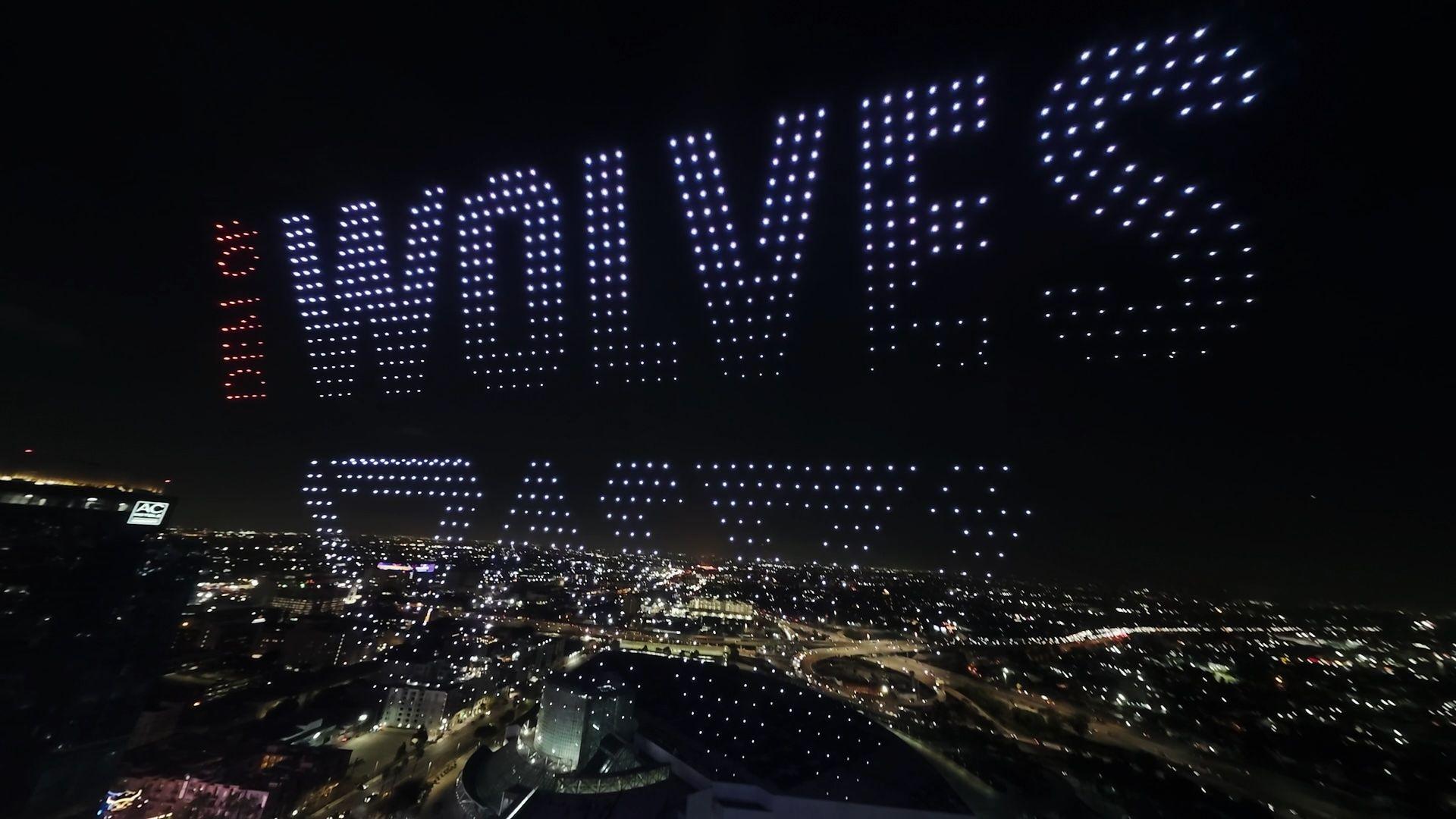 drones in the sky spelling out the logotype of den of wolves