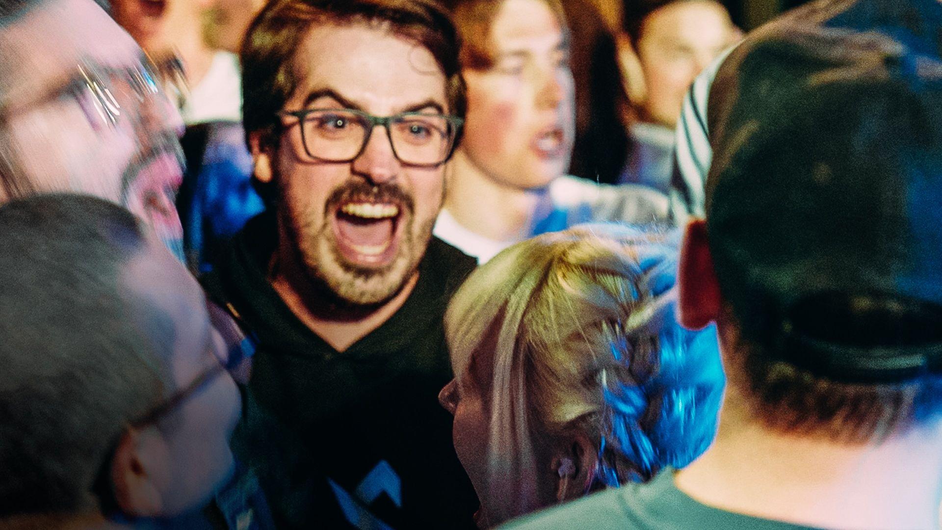 a crowd of people being hyped